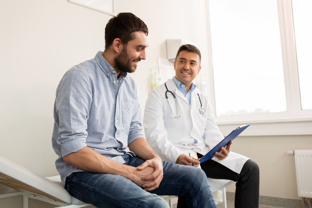 Doctor explaining the benefits of testosterone pellet therapy.